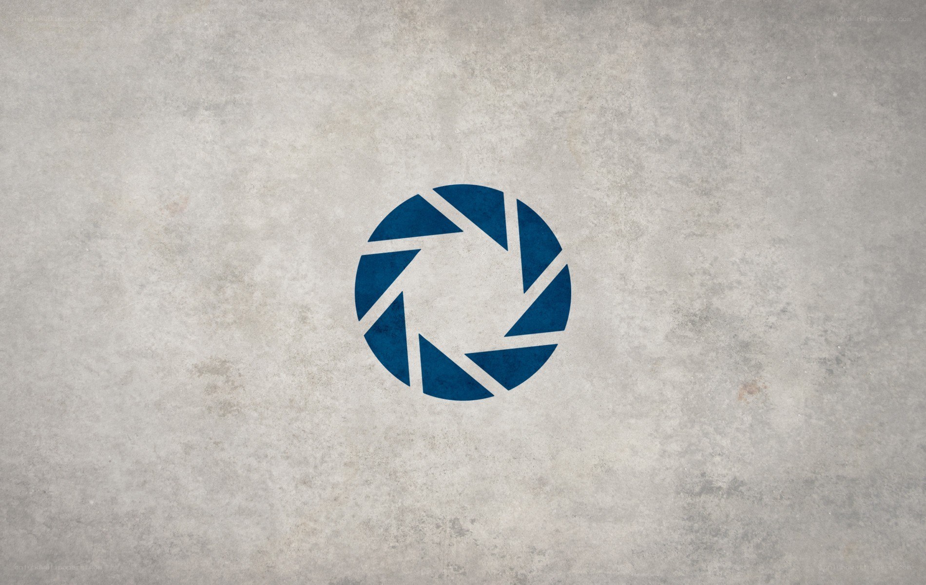 Blue aperture logo on concrete