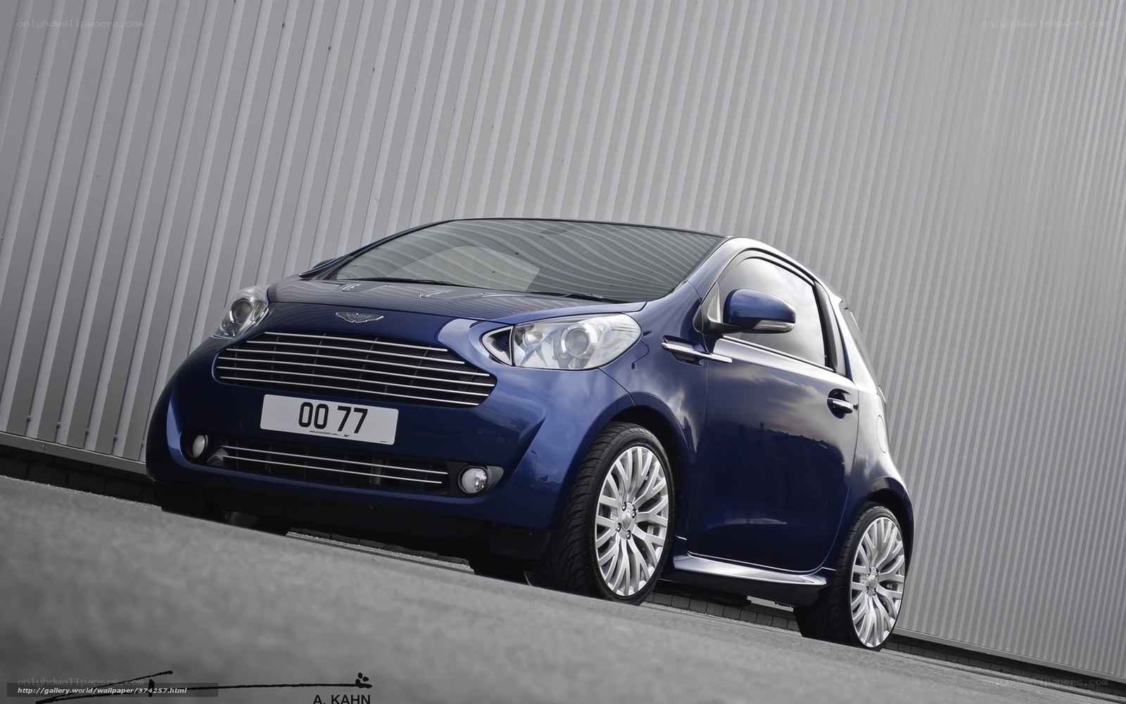 blue aston martin car