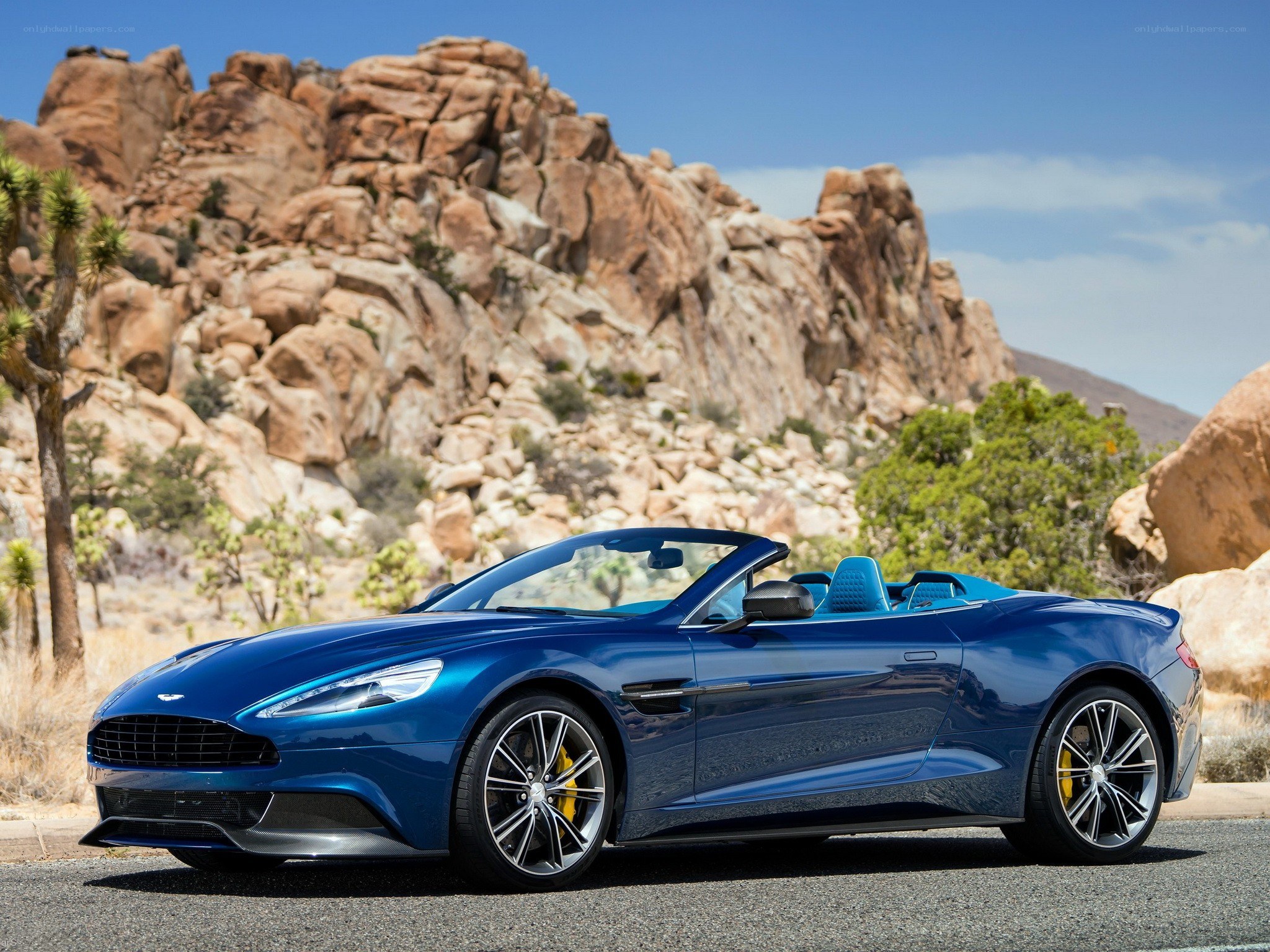 Blue Aston Martin convertible