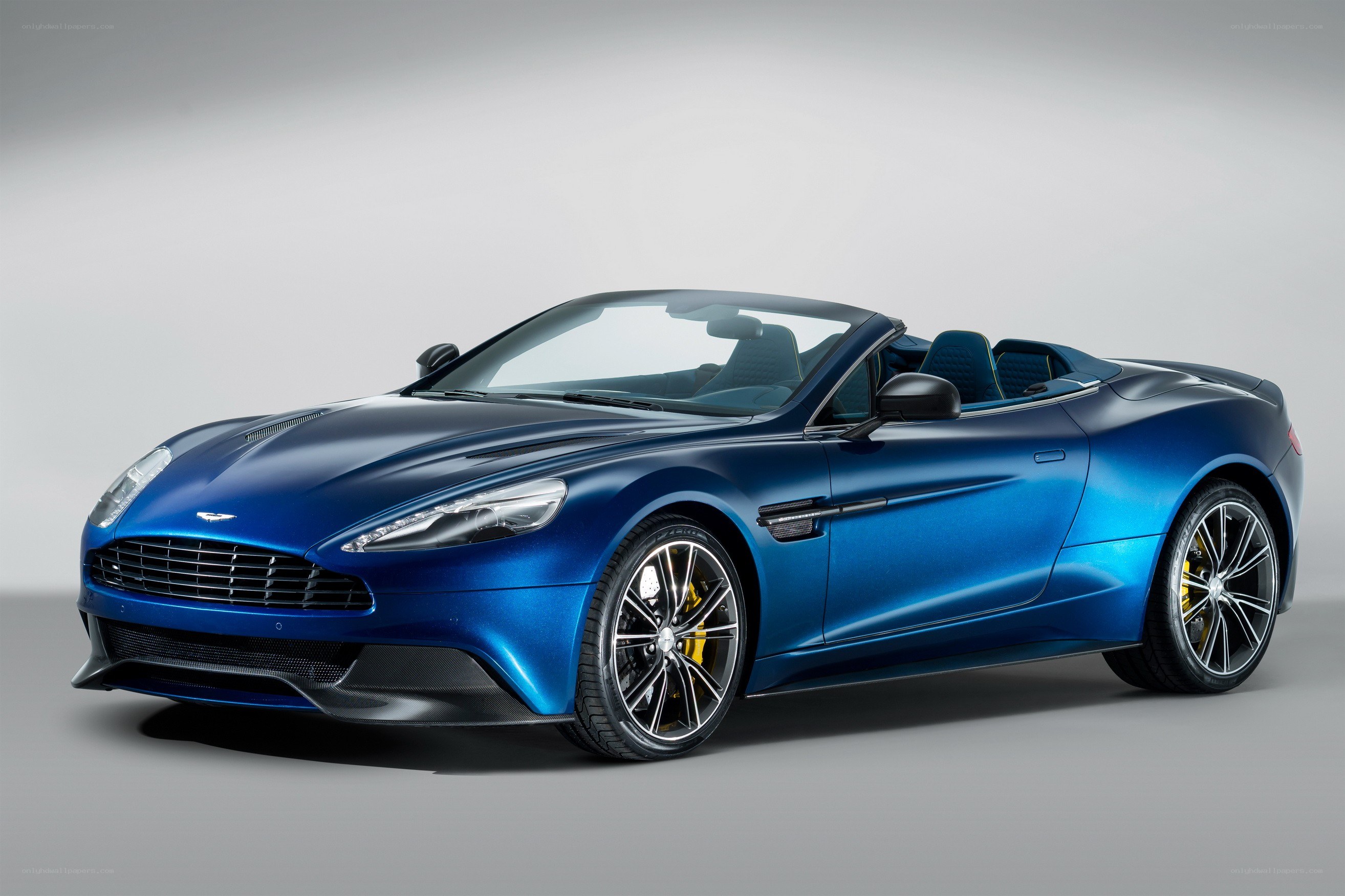 blue aston martin convertible