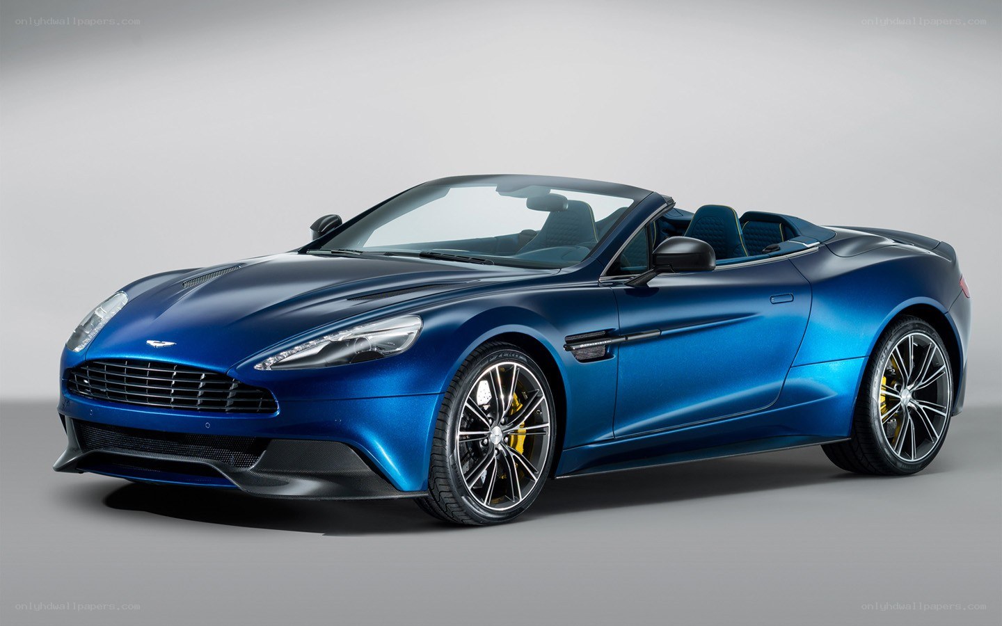 blue aston martin convertible