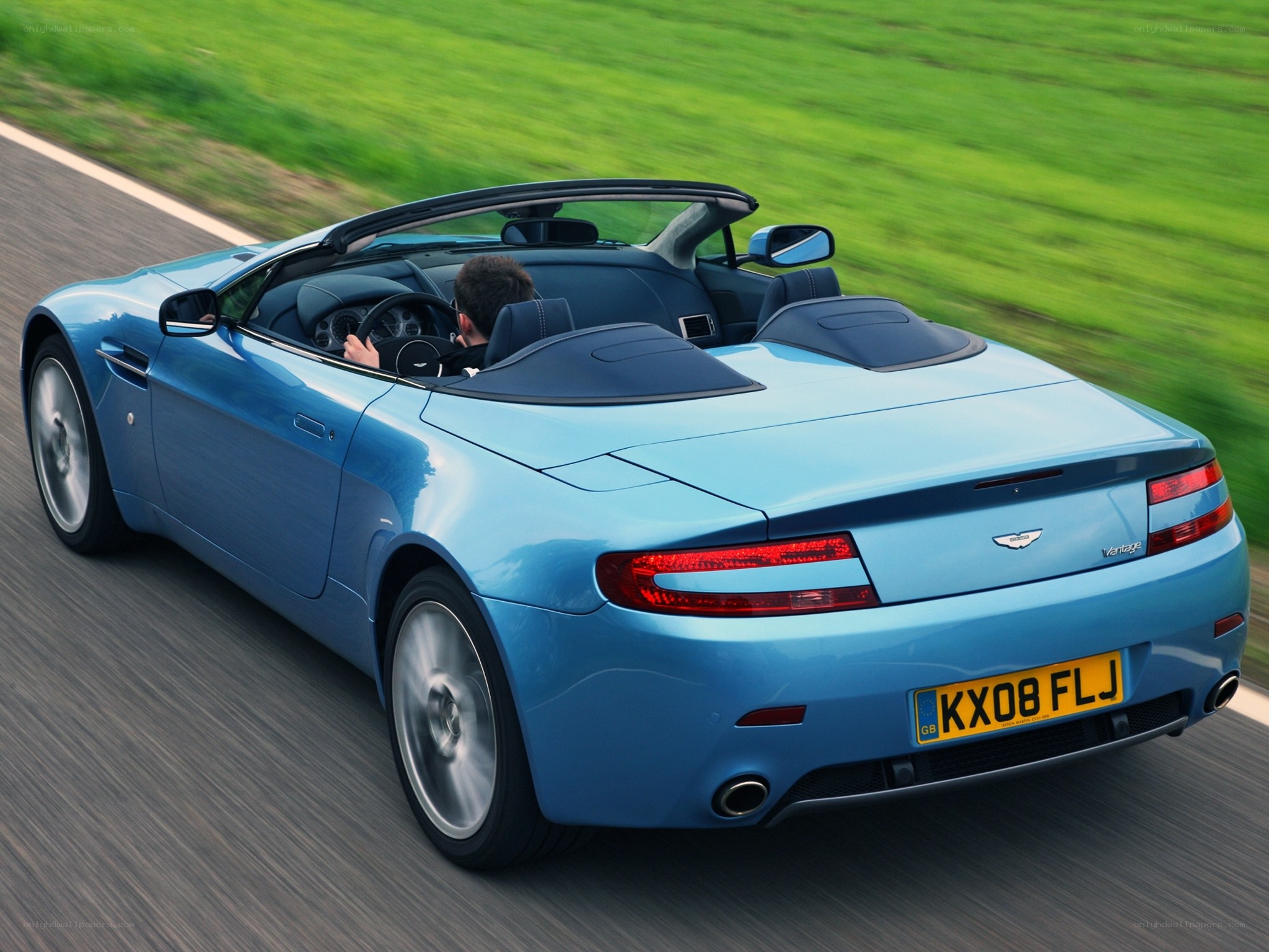blue aston martin convertible