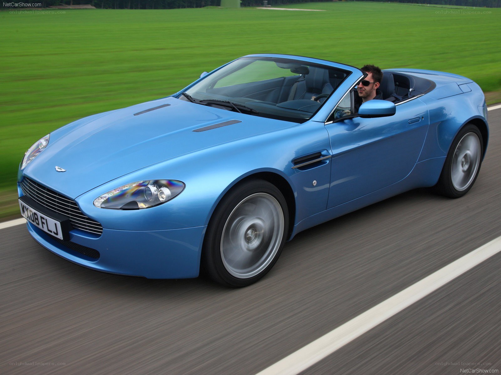 blue aston martin convertible