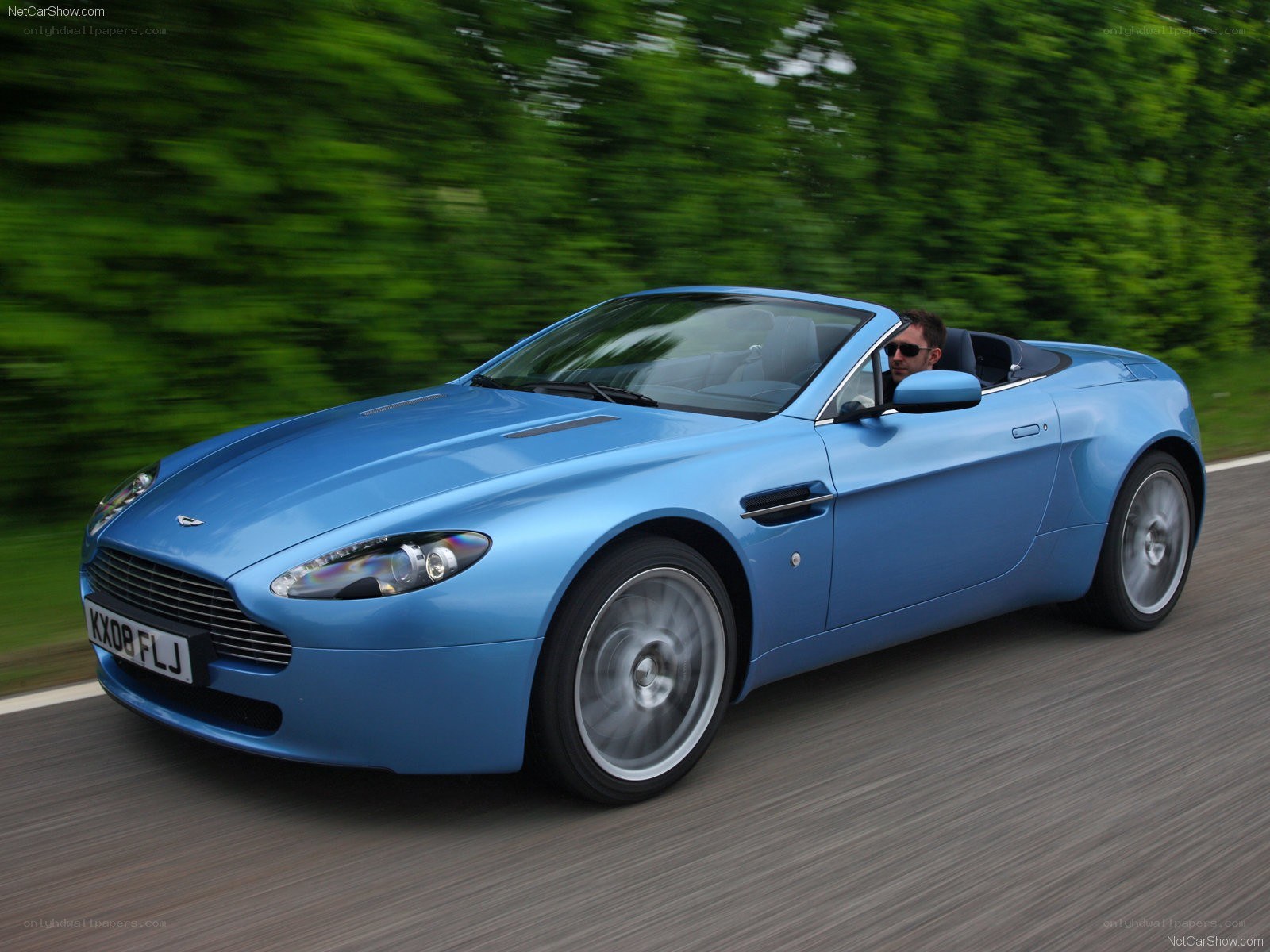 blue aston martin convertible