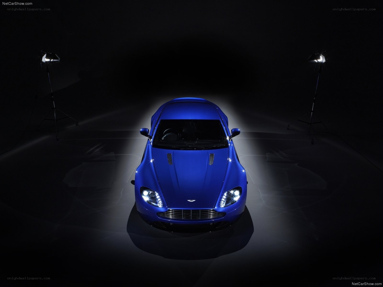 Blue Aston Martin in studio