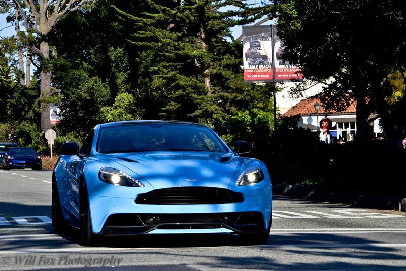 Blue Aston Martin on the street
