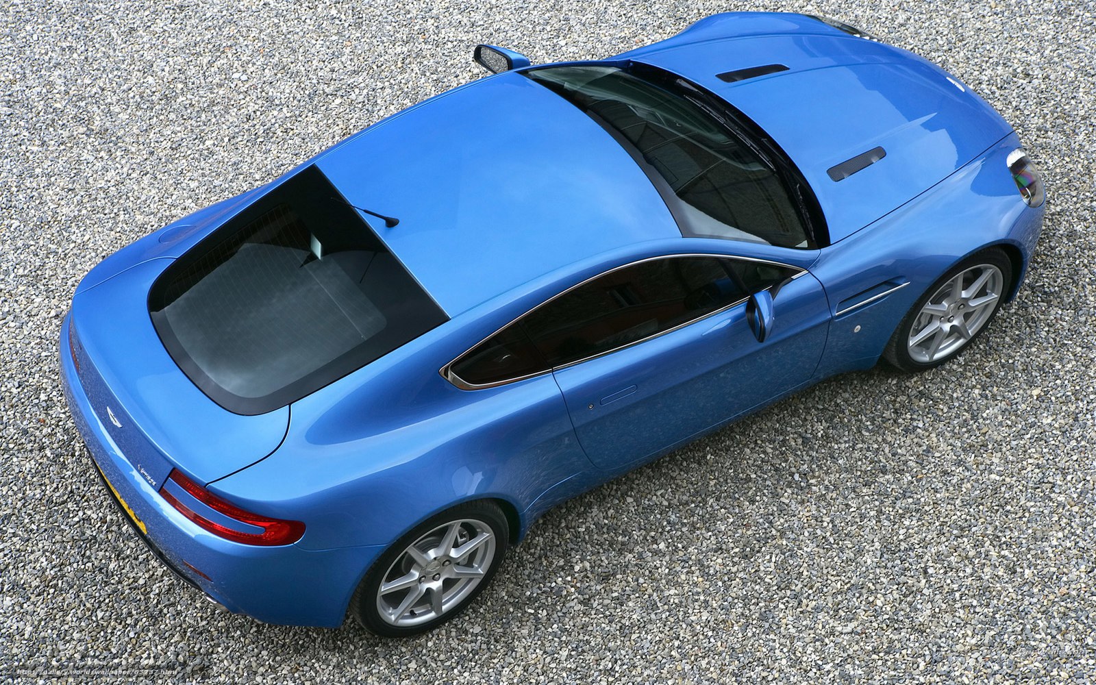 Blue Aston Martin sports car