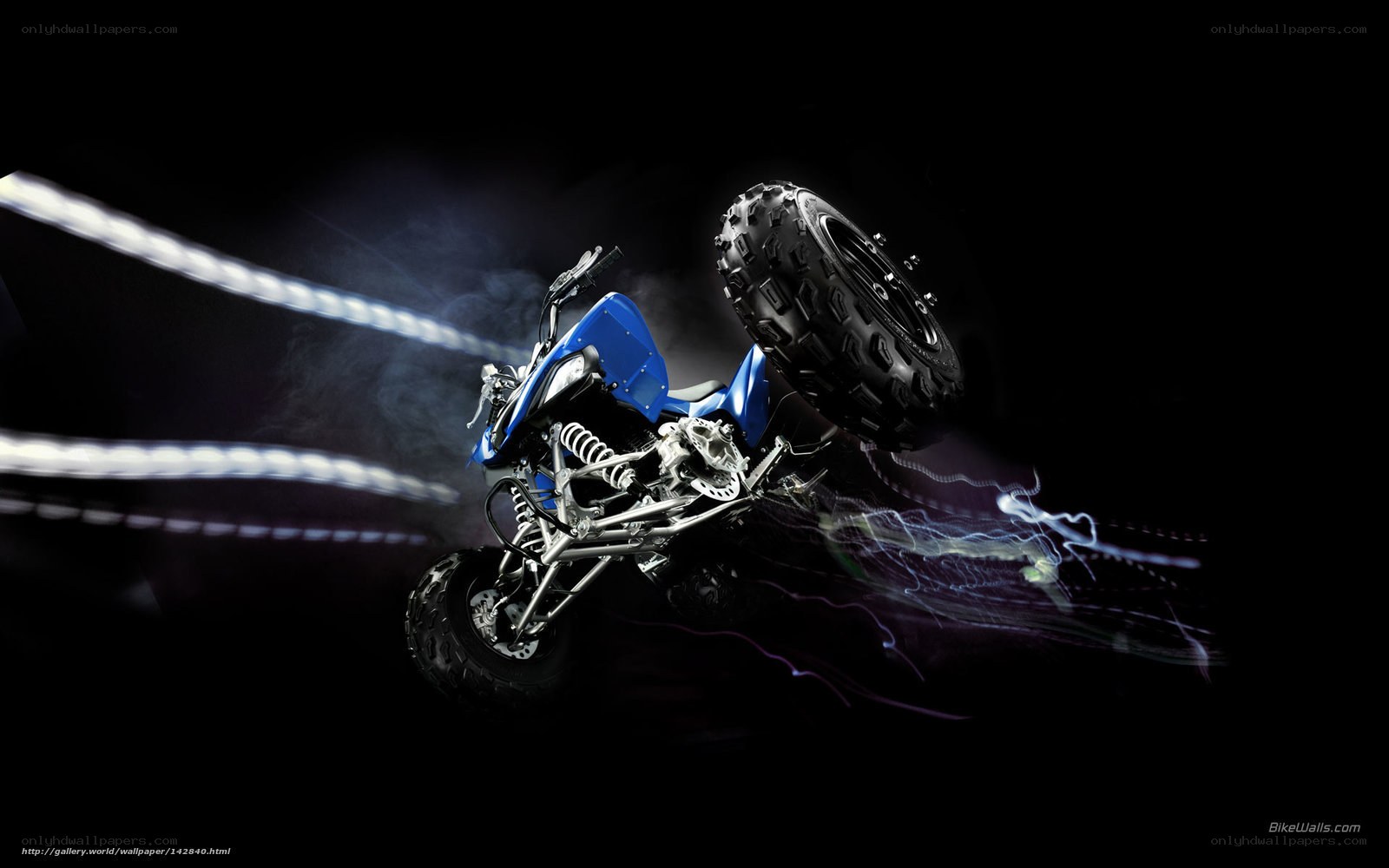 Blue ATV in mid-air stunt