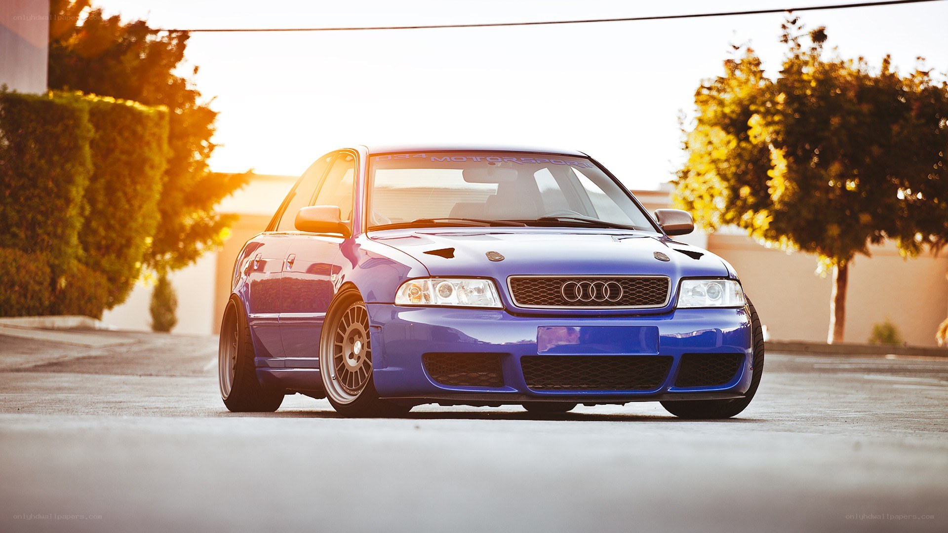 blue audi a4 on asphalt