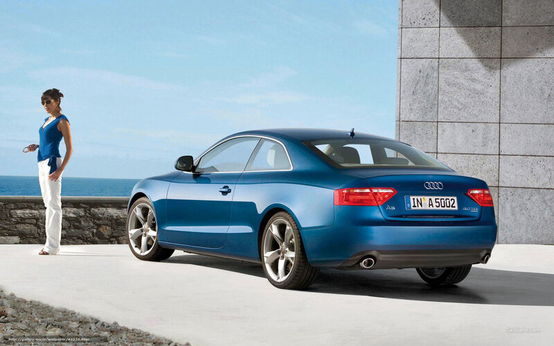 Blue Audi A5 by the sea