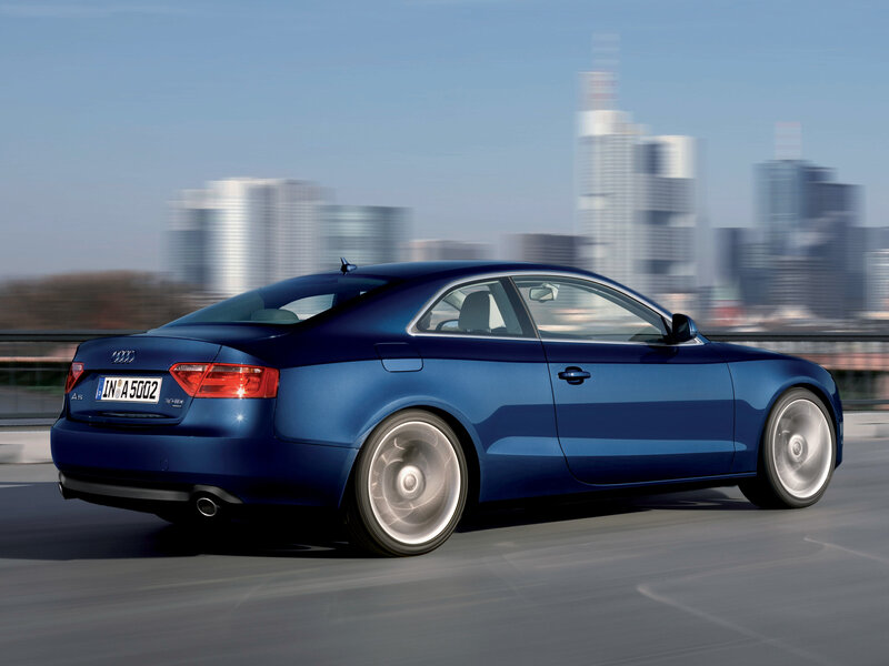 blue audi a5 in motion