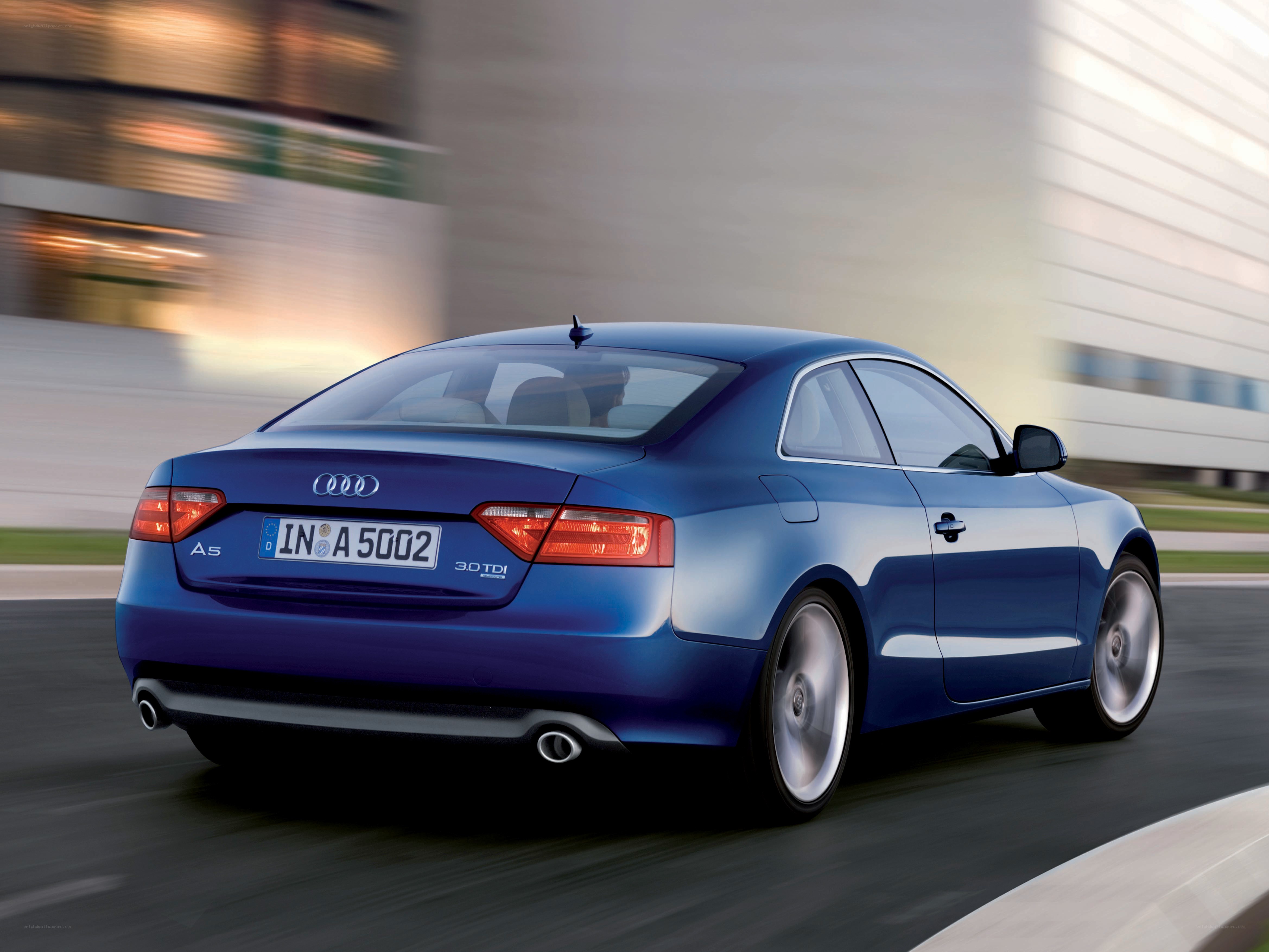 Blue Audi A5 in motion