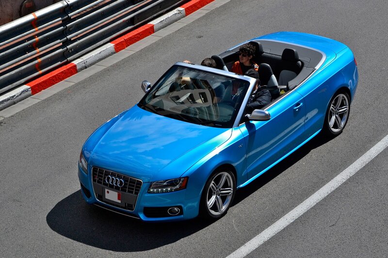 Blue Audi convertible on track