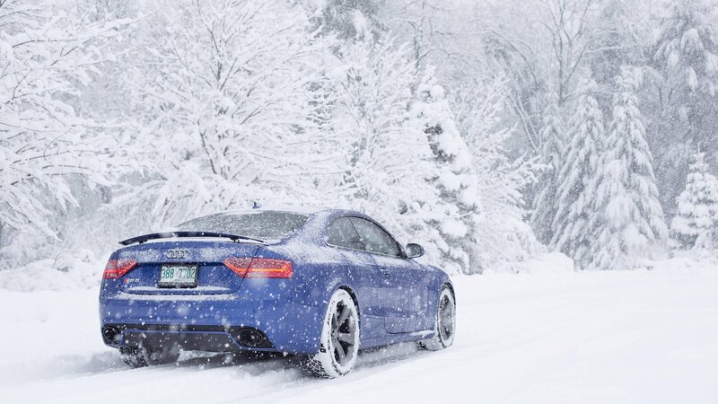 Blue Audi in Snow