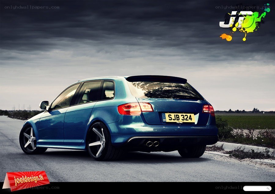 blue audi on a road