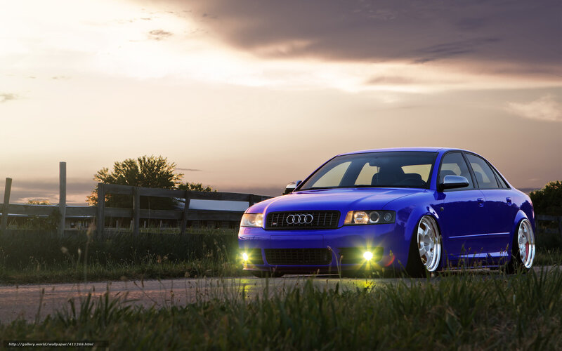 Blue Audi on country road
