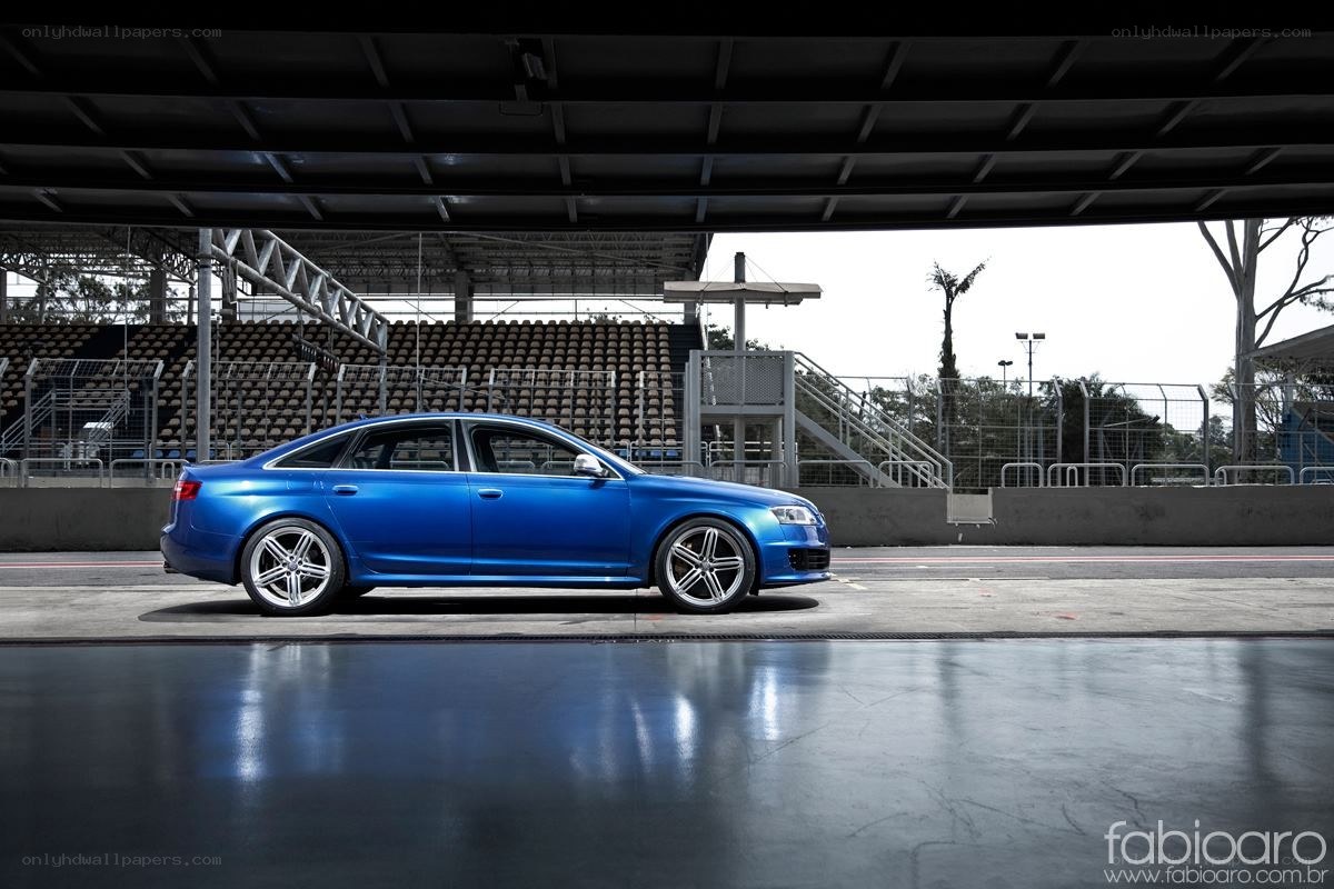 Blue Audi on racetrack