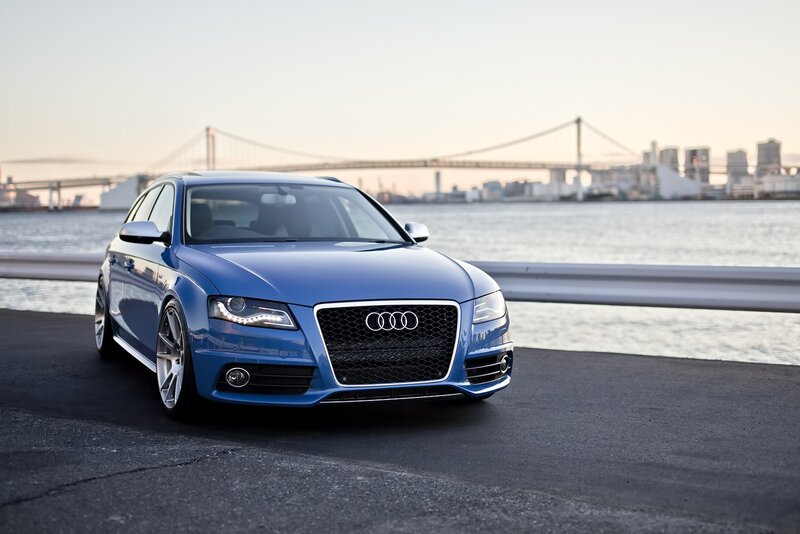 Blue Audi on waterfront