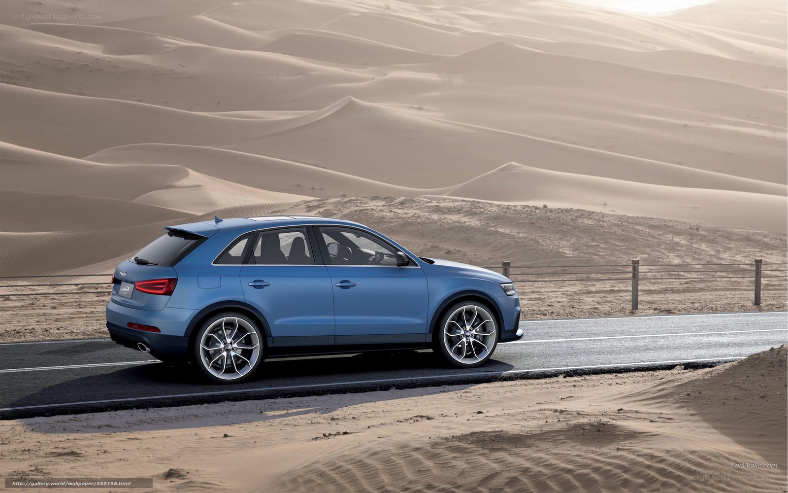 Blue Audi Q3 in desert