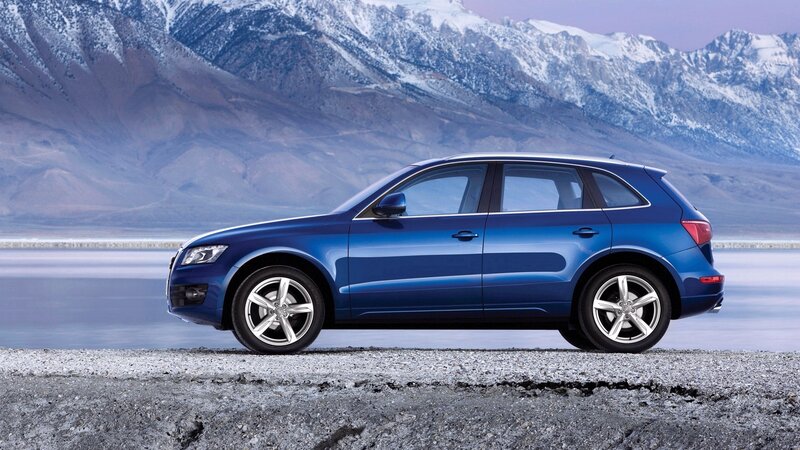 blue audi q5 in mountain landscape