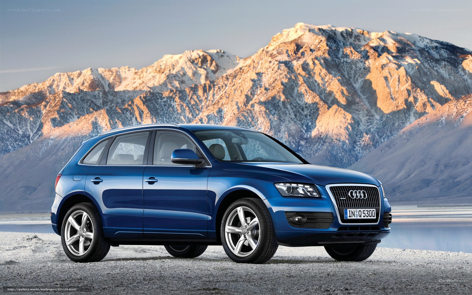 Blue Audi Q5 in mountain landscape