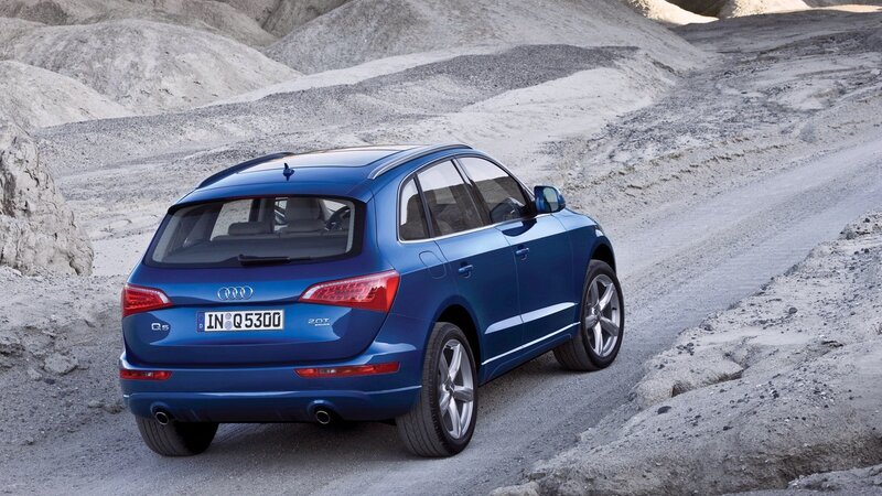 blue audi q5 on dirt road