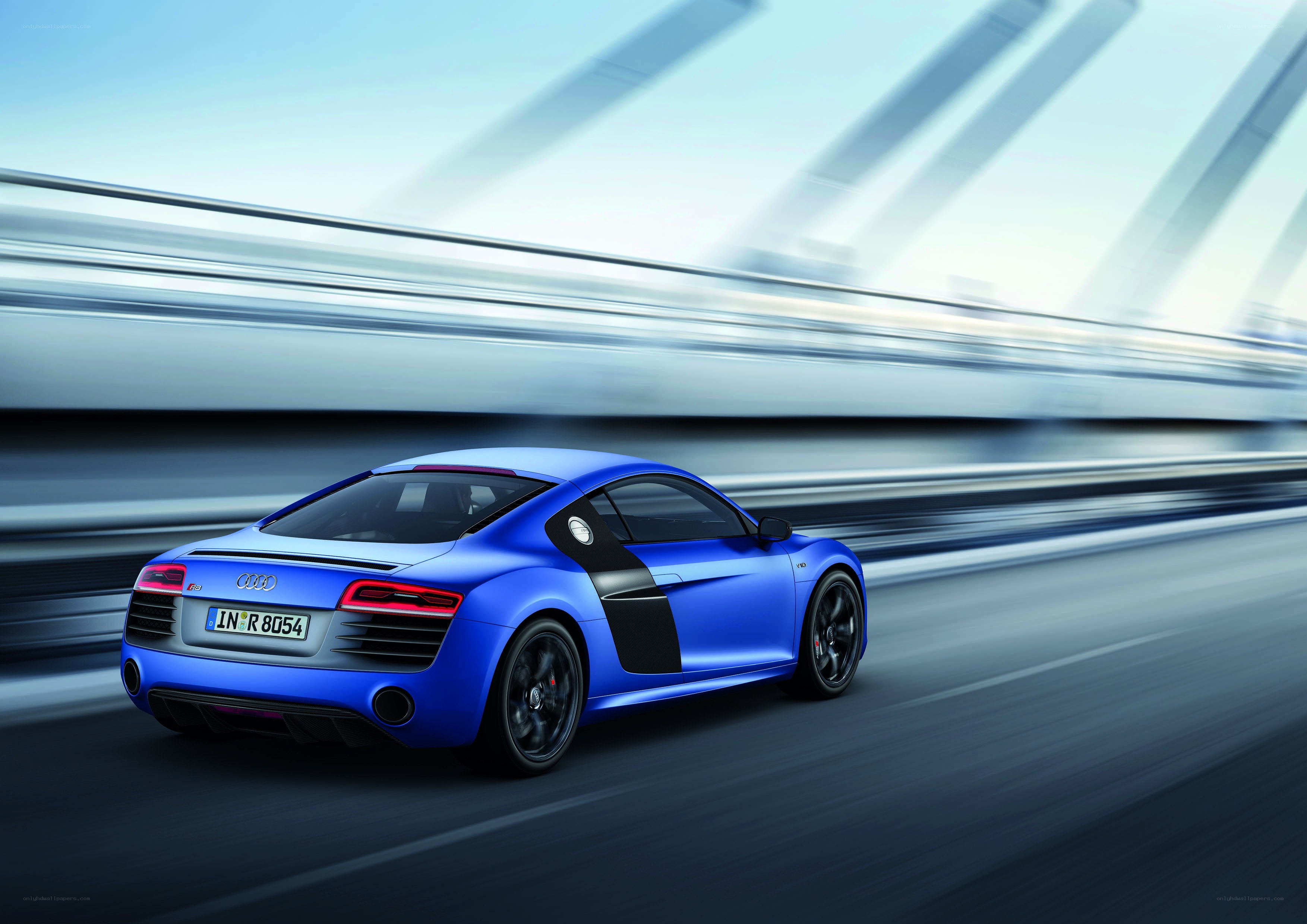 Blue Audi R8 in motion