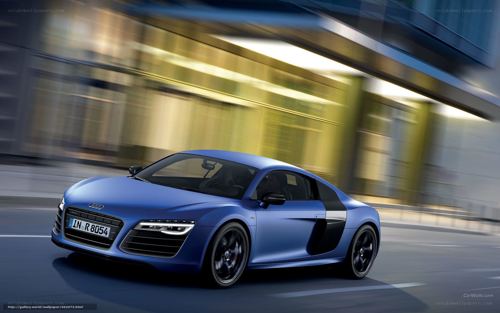 Blue Audi R8 in motion