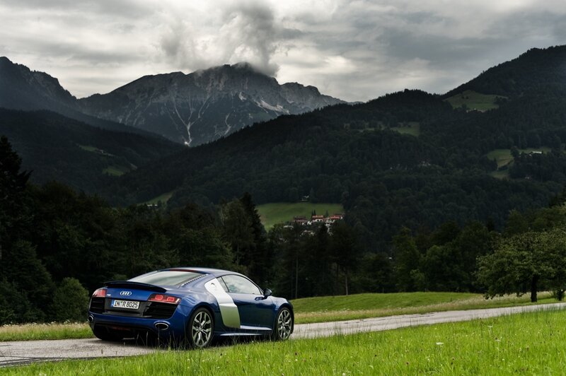 Blue Audi R8 in mountain landscape