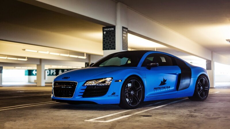 Blue Audi R8 in parking garage