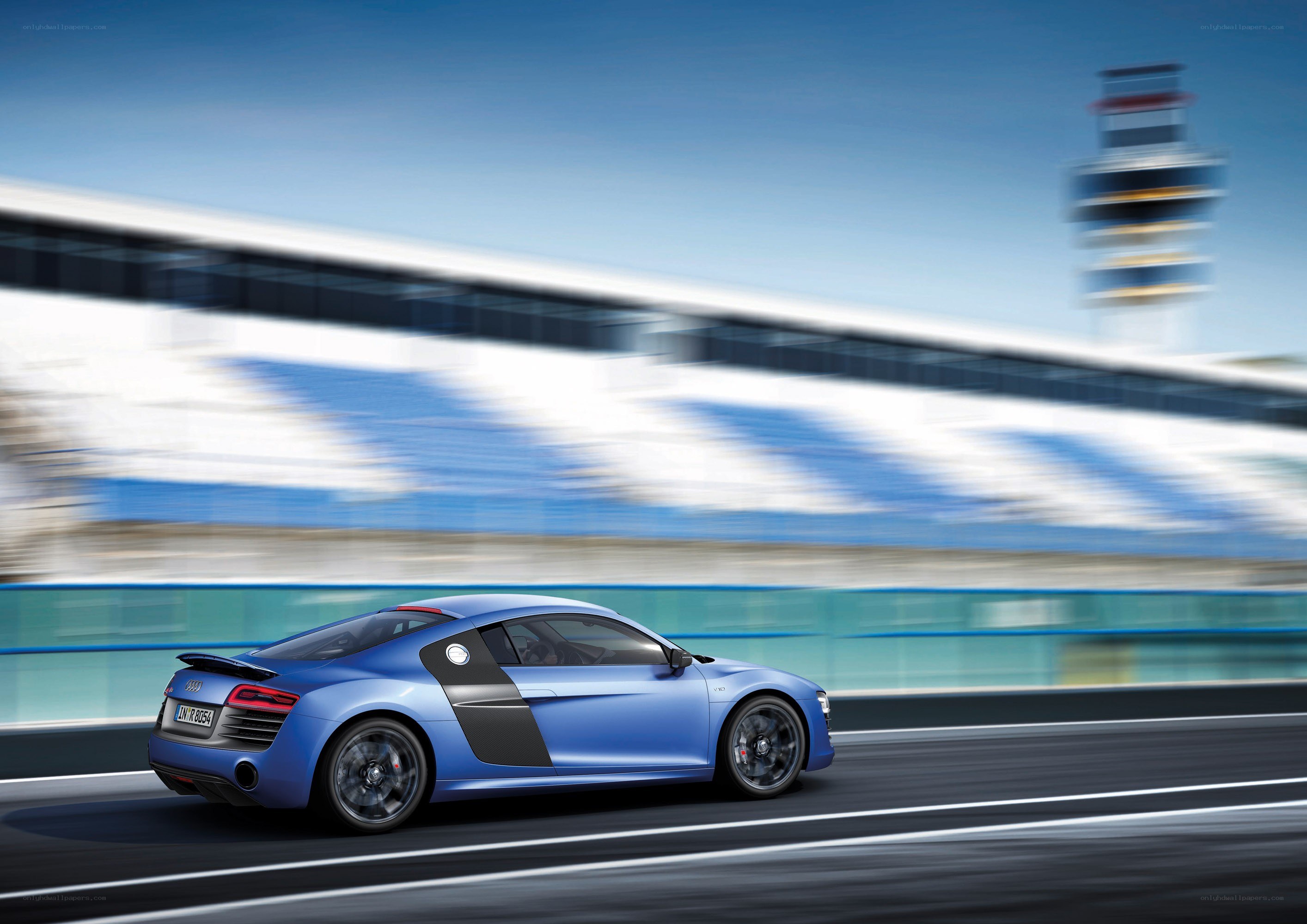 Blue Audi R8 on a racetrack