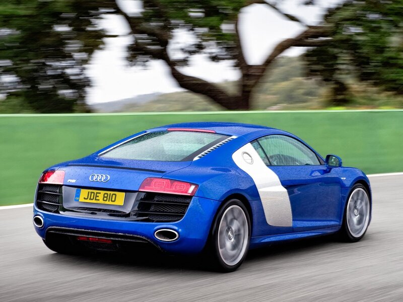 blue audi r8 on a racetrack