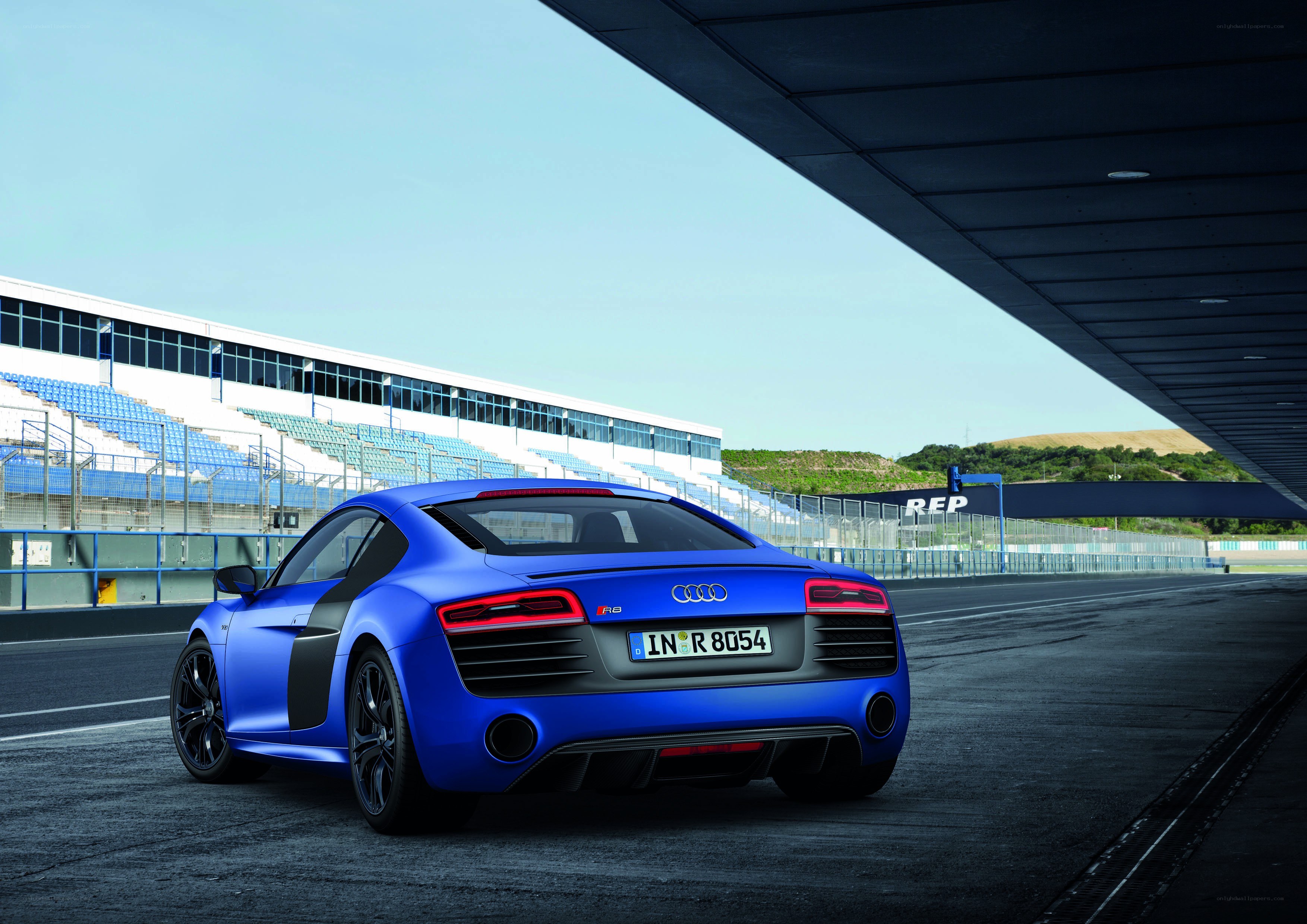 Blue Audi R8 on a racetrack