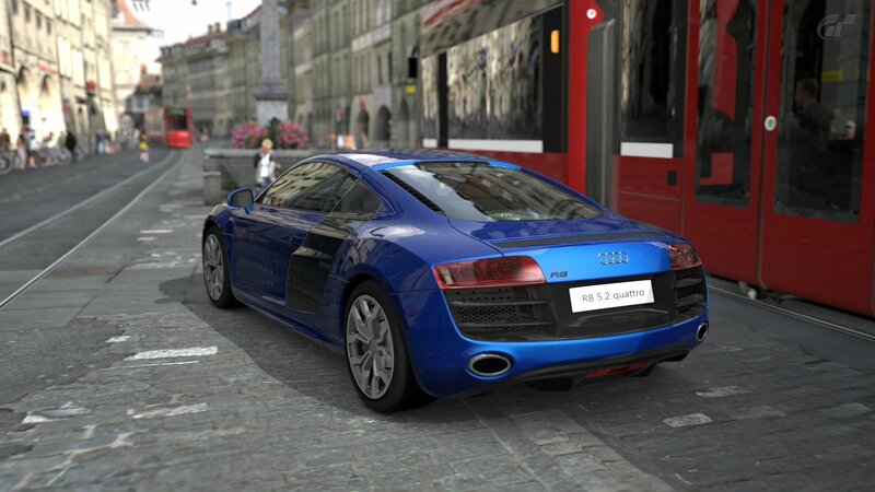 Blue Audi R8 on city street