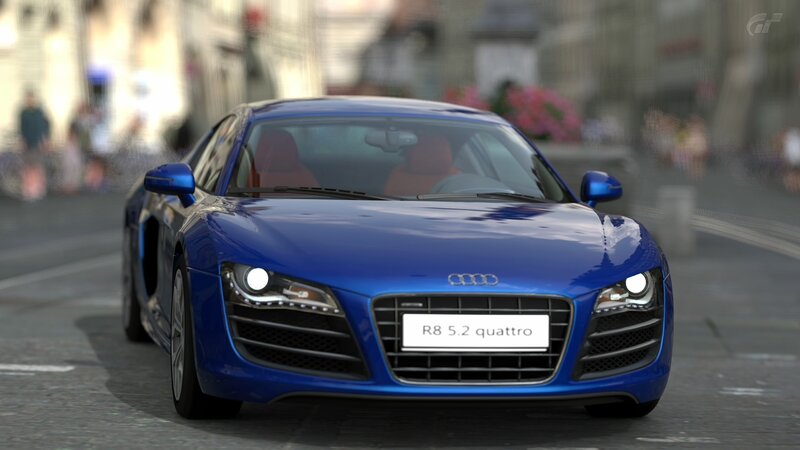 Blue Audi R8 on city street