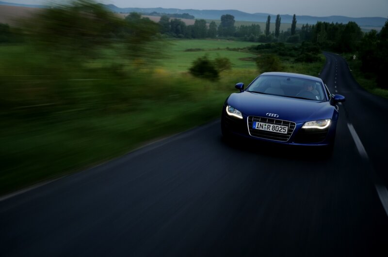 Blue Audi R8 on country road