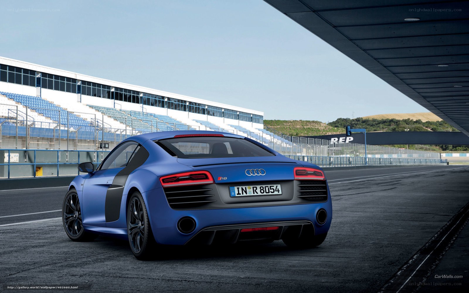 Blue Audi R8 on racetrack
