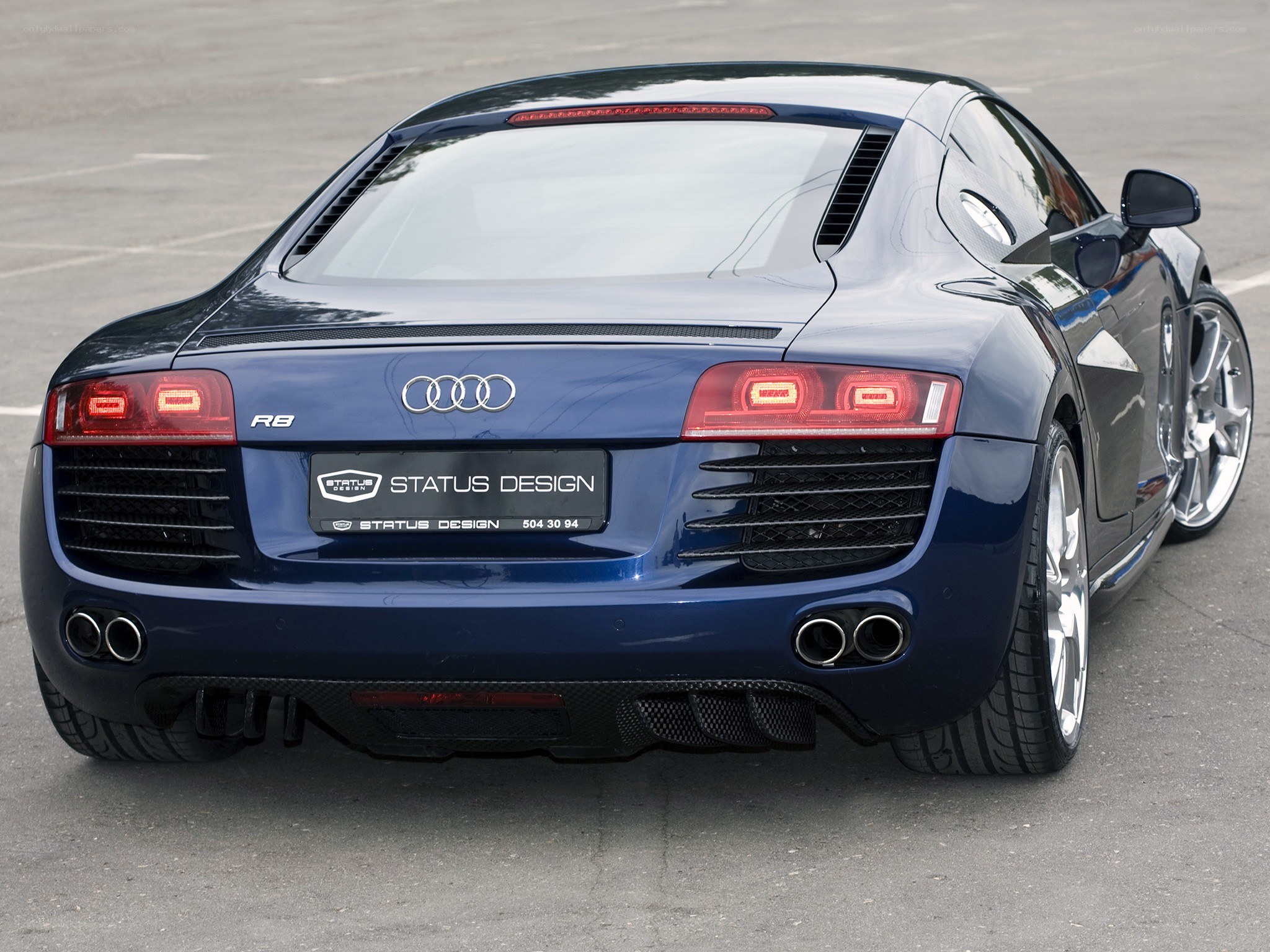blue audi r8 rear view