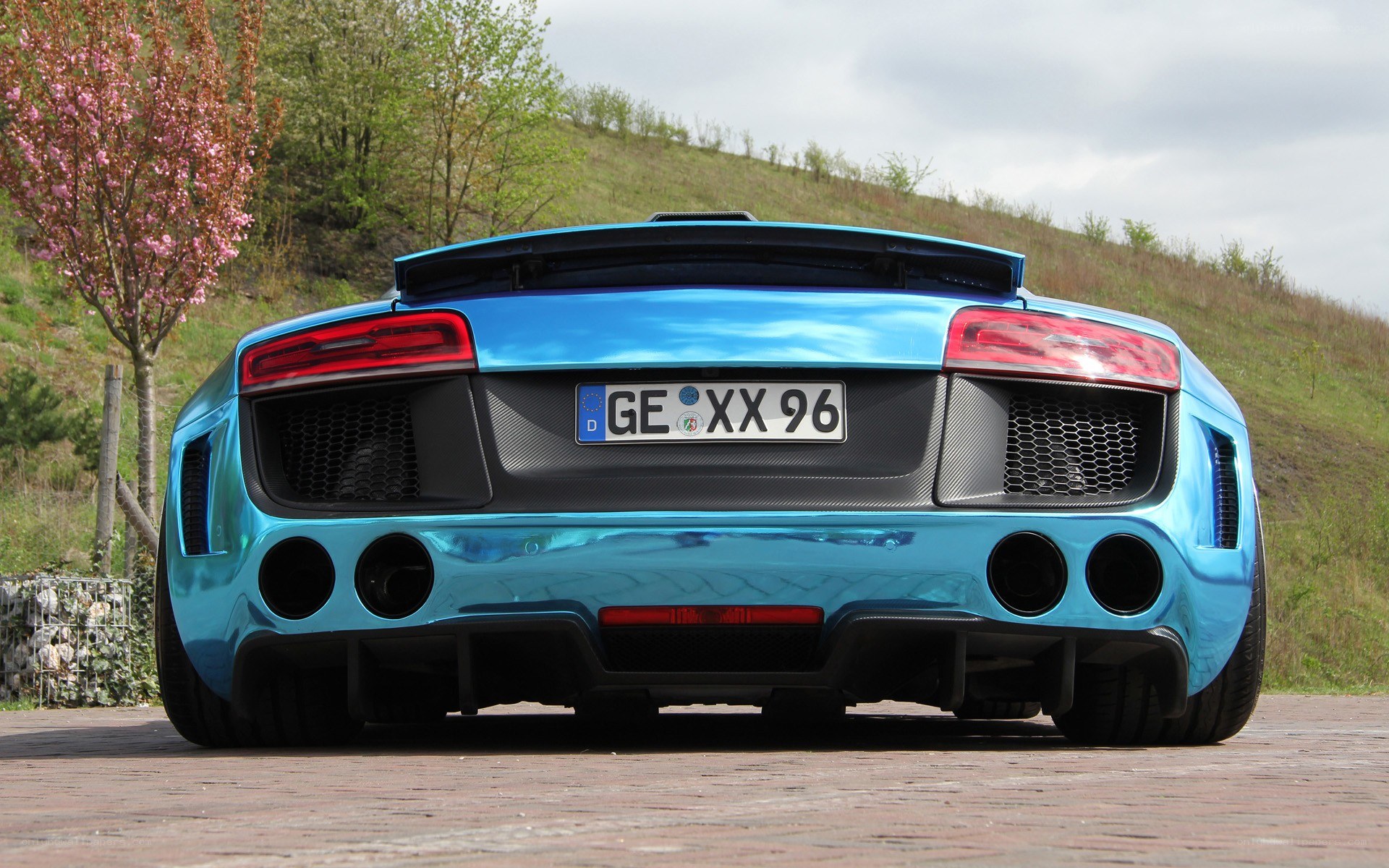 blue audi r8 rear view