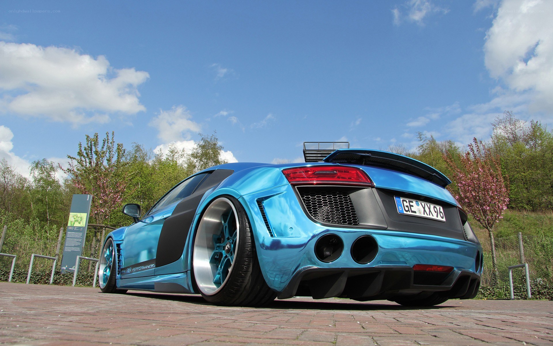 blue audi r8 with custom body kit