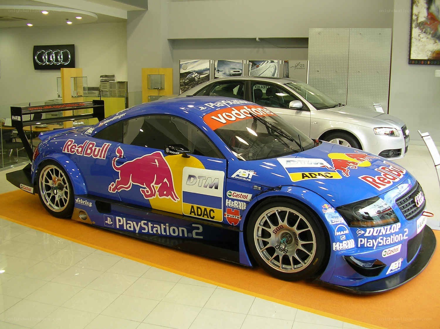 Blue Audi race car on display