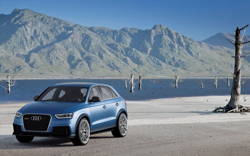 Blue Audi RS Q3 by a lake