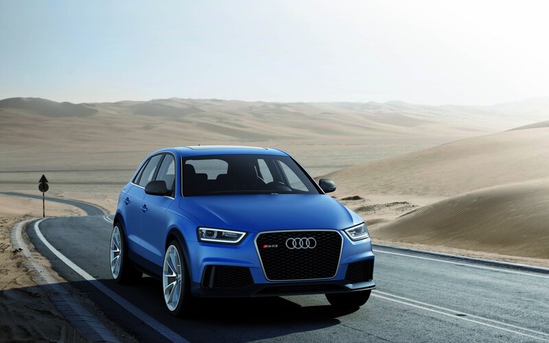 Blue Audi RS Q3 on desert road