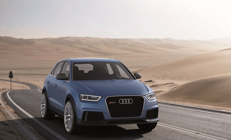 Blue Audi RS Q3 on desert road
