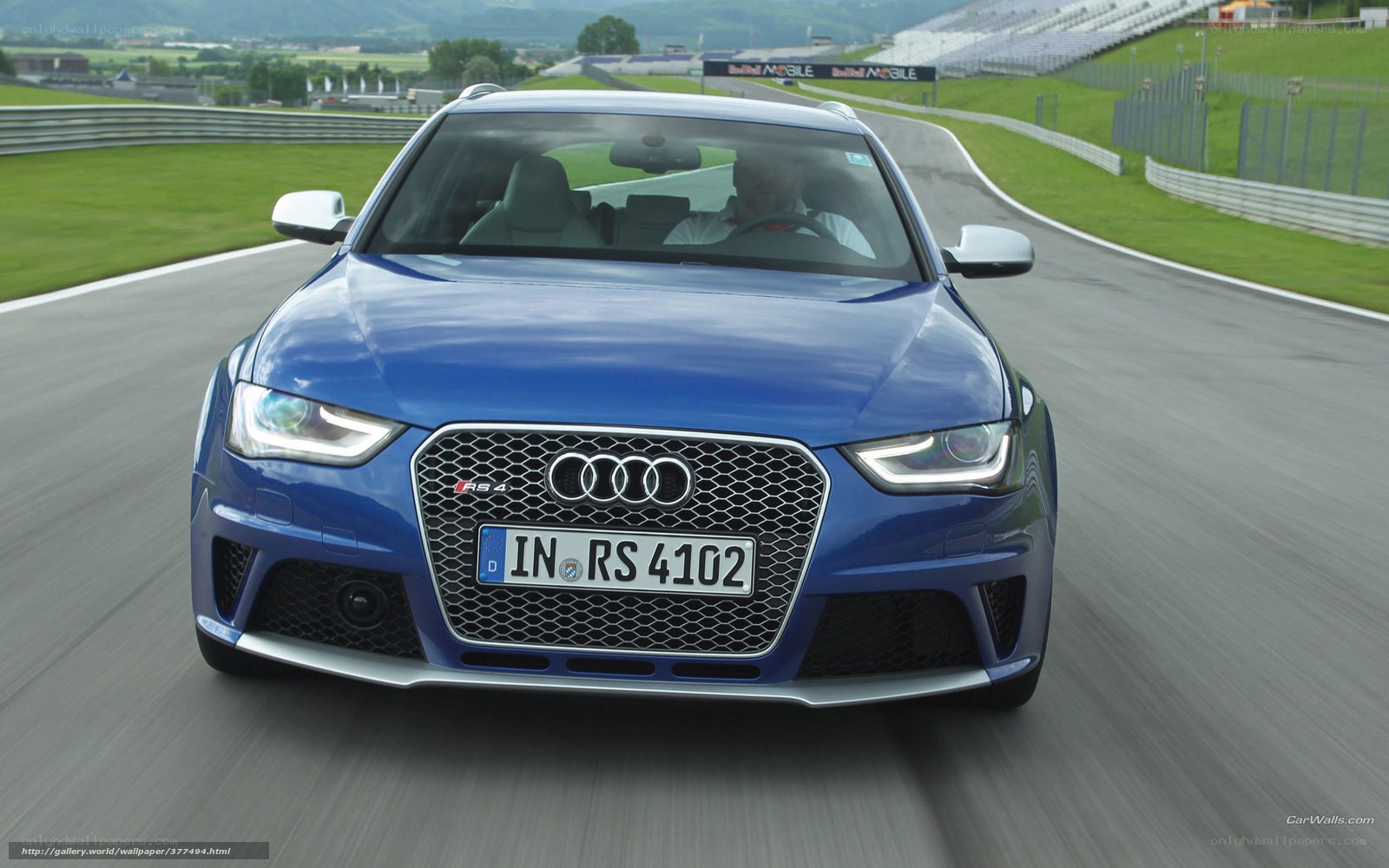 Blue Audi RS4 on racetrack