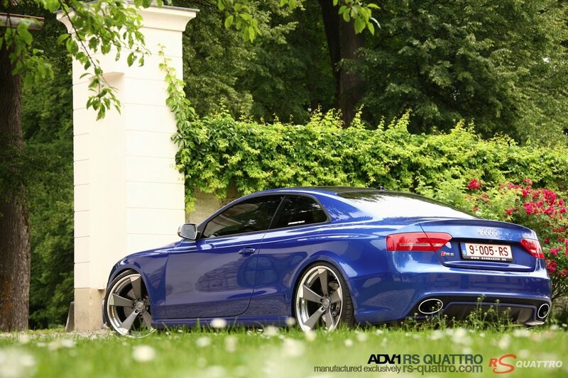 Blue Audi RS5 on grass