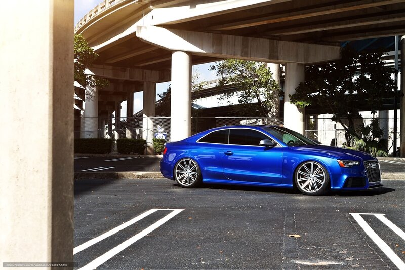 Blue Audi RS5 under overpass