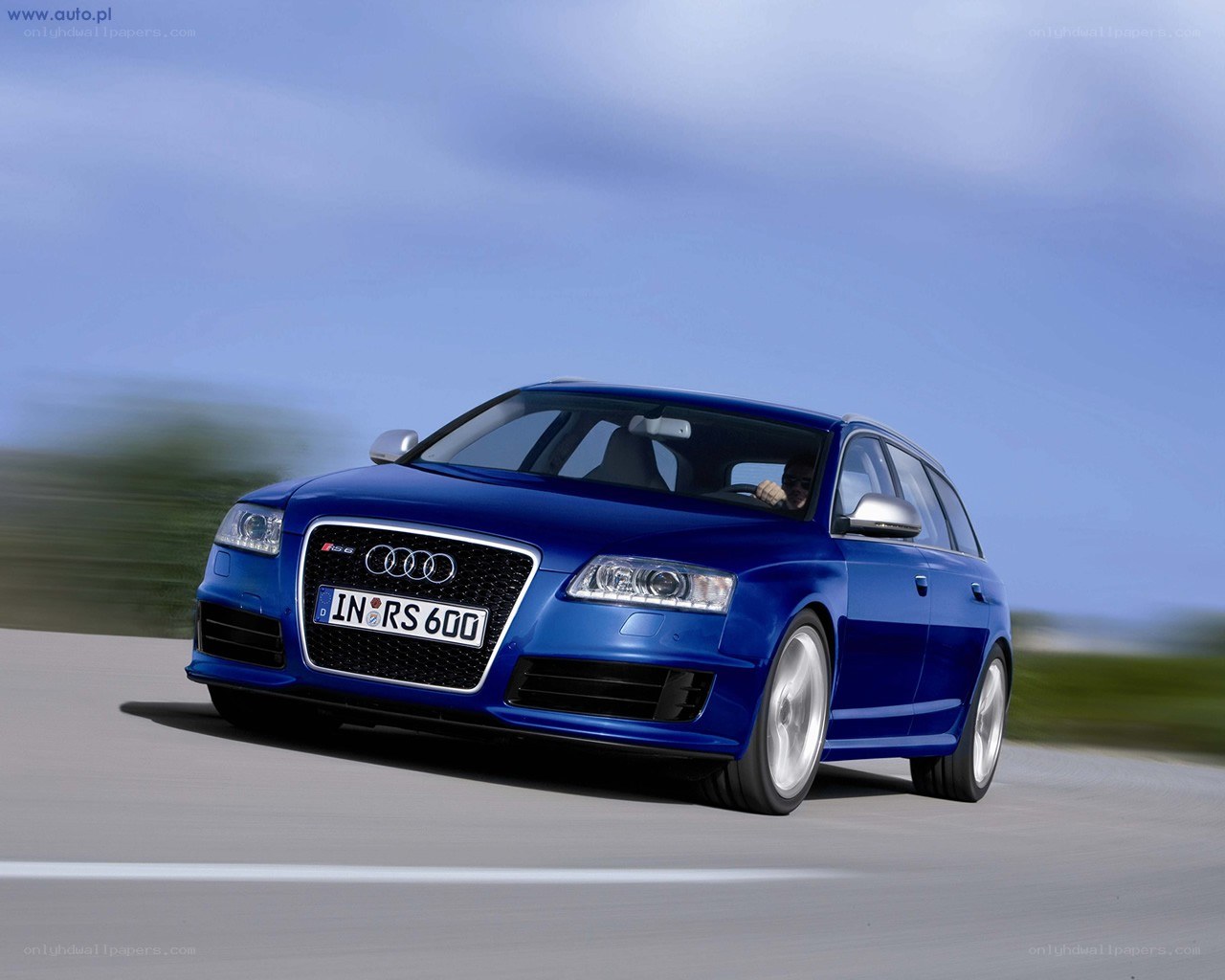 Blue Audi RS6 in motion