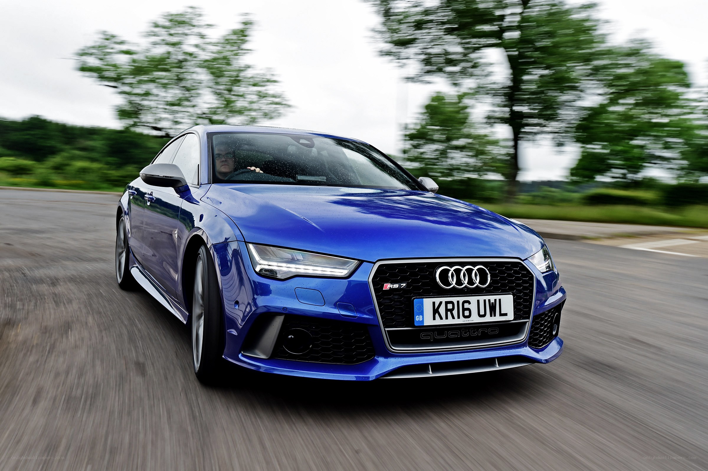 blue audi rs7 in motion