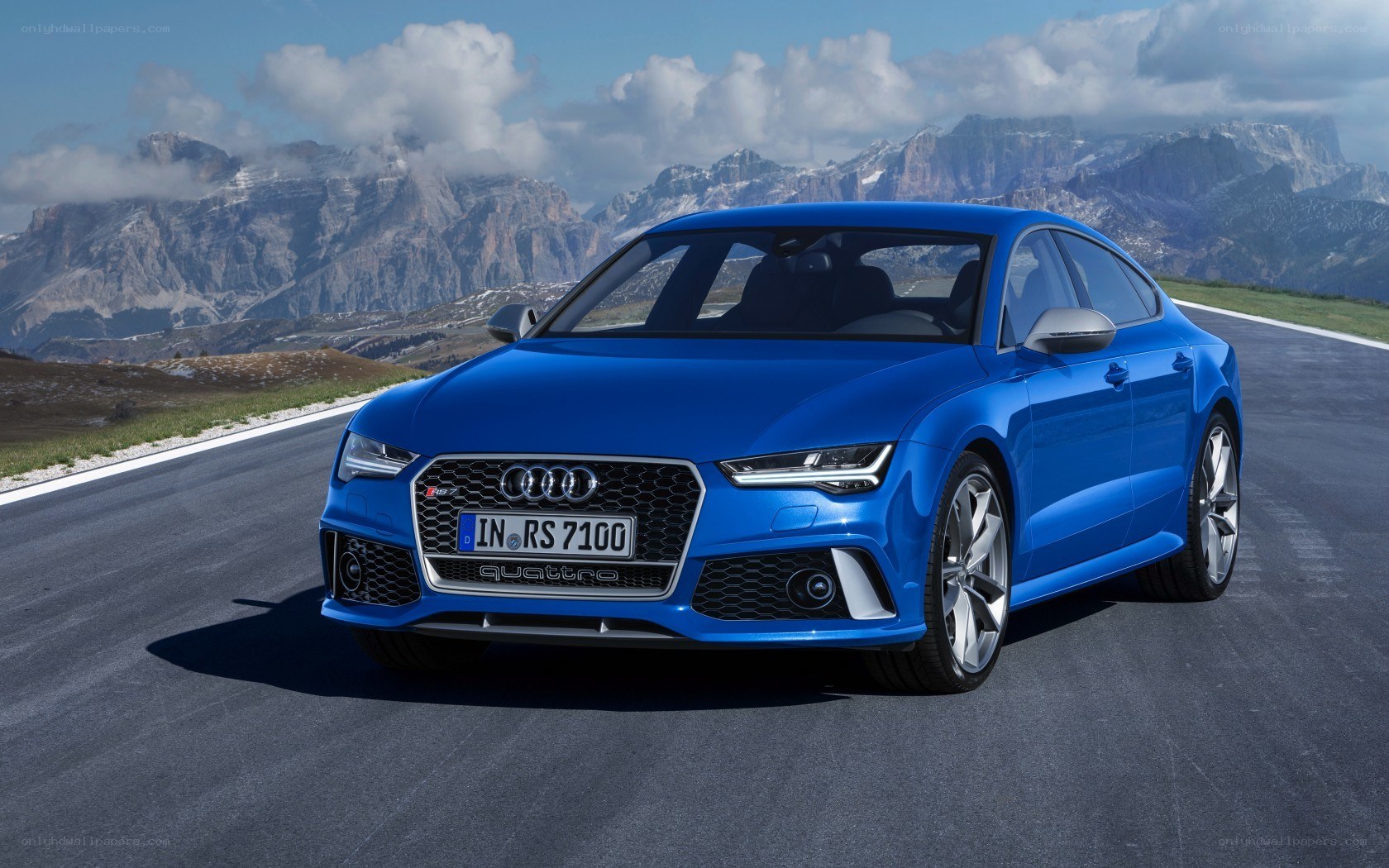 Blue Audi RS7 on mountain road